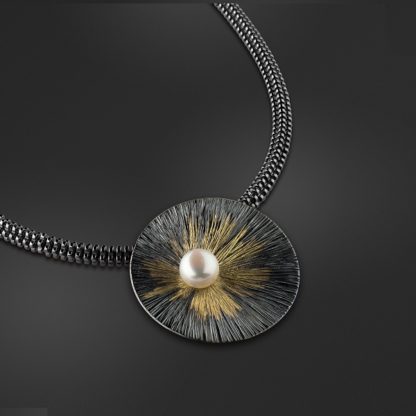 Silver & Gold necklace with pearl