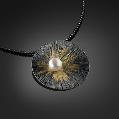 Silver & Gold necklace with pearl